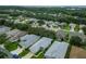 Birds-eye view of community, showcasing homes and landscape at 4985 Rainbow Trout Rd, Tavares, FL 32778