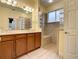 Spa-like bathroom with walk-in shower and double vanity at 4985 Rainbow Trout Rd, Tavares, FL 32778