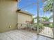 Screened-in porch with tiled floor and small plants at 4985 Rainbow Trout Rd, Tavares, FL 32778