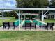 Covered shuffleboard courts offer shaded recreation at 4985 Rainbow Trout Rd, Tavares, FL 32778