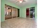 Sunroom with tile floors and sliding glass doors at 4985 Rainbow Trout Rd, Tavares, FL 32778