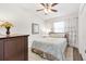 Cozy bedroom with neutral tones and ceiling fan at 525 Bonita Dr, Lady Lake, FL 32159