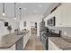 Kitchen with stainless steel appliances and granite countertops at 6206 Dingman Way, The Villages, FL 32163