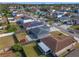 Aerial view of a house with solar panels and a fenced backyard at 6739 Lorain Street, Orlando, FL 32810