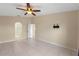 Spacious bedroom with tile flooring and ceiling fan at 6739 Lorain Street, Orlando, FL 32810