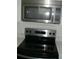 Stainless steel microwave and oven range at 703 Sullivan Ave, Ocoee, FL 34761