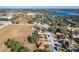 Aerial view of residential neighborhood near lake at 733 Cherry Laurel St, Minneola, FL 34715