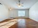 Living room with hardwood floors and a door to outside at 733 Cherry Laurel St, Minneola, FL 34715