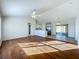 Bright living room with hardwood floors and high ceilings at 733 Cherry Laurel St, Minneola, FL 34715