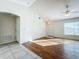 Living room with hardwood floors and a door to outside at 733 Cherry Laurel St, Minneola, FL 34715