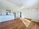 Bright living room with hardwood floors and high ceilings at 733 Cherry Laurel St, Minneola, FL 34715