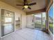 Screened porch with access to kitchen and backyard views at 733 Cherry Laurel St, Minneola, FL 34715