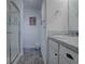 Bright bathroom featuring a glass shower, sink, and white cabinets, designed for a clean and modern aesthetic at 802 Nancy Dr, The Villages, FL 32163