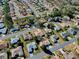 Aerial view of a residential neighborhood with single Gathering homes at 8460 Se 137Th Loop, Summerfield, FL 34491