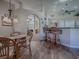 Cozy dining area adjacent to the kitchen and living room at 8460 Se 137Th Loop, Summerfield, FL 34491