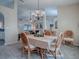 Bright dining room with a table, chairs, and view to living room at 8460 Se 137Th Loop, Summerfield, FL 34491