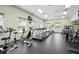 Well-equipped fitness center featuring treadmills and exercise bikes at 8493 Hartford Way, Mount Dora, FL 32757