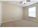 Bright bedroom with carpeted floor and window blinds at 870 Vindale Rd, Tavares, FL 32778