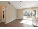 Bright dining area with sliding glass doors leading to the backyard at 870 Vindale Rd, Tavares, FL 32778