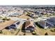 Aerial view of houses with solar panels and lush landscaping at 96 Silver Maple Rd, Groveland, FL 34736