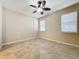 Bright bedroom with tile flooring and ceiling fan at 96 Silver Maple Rd, Groveland, FL 34736