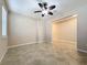 Bright bedroom with tile flooring and ceiling fan at 96 Silver Maple Rd, Groveland, FL 34736