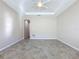 Spacious bedroom with tile flooring and neutral wall colors at 96 Silver Maple Rd, Groveland, FL 34736