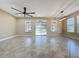 Dining room with tile floors, sliding glass doors, and lots of natural light at 96 Silver Maple Rd, Groveland, FL 34736