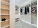 Large walk-in closet with ample shelving and hanging space at 96 Silver Maple Rd, Groveland, FL 34736