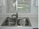 Double stainless steel kitchen sink at 703 Sullivan Ave, Ocoee, FL 34761