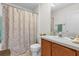 Clean bathroom with shower/tub combo, vanity, and toilet at 3001 Saint Thomas Ln, The Villages, FL 32162