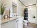 Bathroom with a shower/tub combo, white vanity, and wood-look floors at 00 Mark Ave, Lady Lake, FL 32159