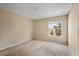 Bedroom with carpeted floors and a window overlooking a yard at 10962 Willow Ridge Loop, Orlando, FL 32825