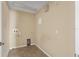 Small laundry room with space for washer and dryer at 10962 Willow Ridge Loop, Orlando, FL 32825