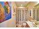 Single vanity bathroom with shower/tub combo at 113 Pecorri Ct, Auburndale, FL 33823