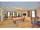 Game room with pool table, arcade game, and seating at 113 Pecorri Ct, Auburndale, FL 33823