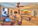 Entertaining game room with arcade games, billiard table, bar area and comfortable seating at 113 Pecorri Ct, Auburndale, FL 33823