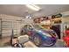 Two-car garage with overhead storage and room for a workshop at 113 Pecorri Ct, Auburndale, FL 33823