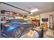 Two-car garage with overhead storage and room for a workshop at 113 Pecorri Ct, Auburndale, FL 33823