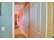 Hallway with doors to bedrooms and other rooms at 113 Pecorri Ct, Auburndale, FL 33823