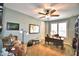 Bright home office features built-in shelving and a large window at 113 Pecorri Ct, Auburndale, FL 33823