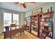 Spacious home office with ample built-in shelving at 113 Pecorri Ct, Auburndale, FL 33823