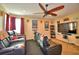 Home theater with reclining seats and large TV at 113 Pecorri Ct, Auburndale, FL 33823