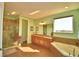 Primary bathroom with soaking tub, shower, and double vanity at 113 Pecorri Ct, Auburndale, FL 33823