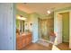 Primary bathroom with shower, double vanity, and separate toilet at 113 Pecorri Ct, Auburndale, FL 33823
