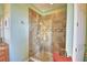 Large walk-in shower with glass enclosure and tile surround at 113 Pecorri Ct, Auburndale, FL 33823