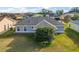 Aerial view of house showcasing backyard and roof at 11579 Se 172Nd Loop, Summerfield, FL 34491