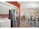 Kitchen views into spacious dining area with light flooring at 11579 Se 172Nd Loop, Summerfield, FL 34491