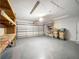 An empty garage with shelves and storage space at 11744 Oswalt Rd, Clermont, FL 34711