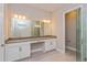 Bathroom with double vanity, a large mirror, and a glass shower at 14261 Crest Palm Ave, Windermere, FL 34786